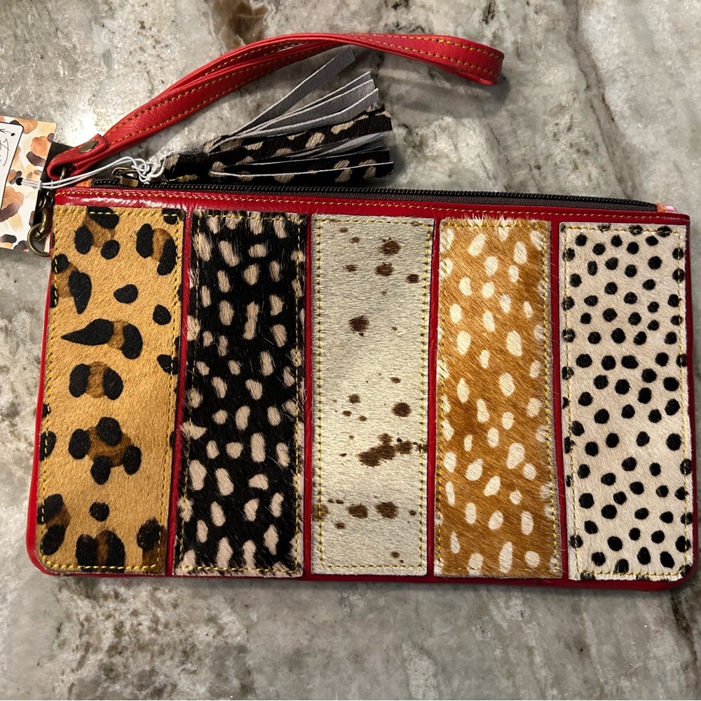 Wristlet with hide on hair detail patchwork